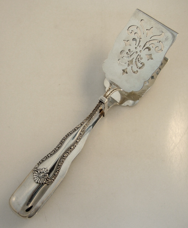 Sterling Silver Sandwich Tongs With Openwork Decorative Embellishment 1890