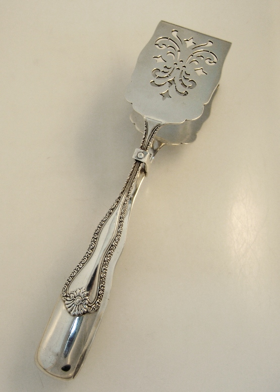 Sterling Silver Sandwich Tongs With Openwork Decorative Embellishment 1890
