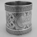 .Repousse Floral Napkin Ring Wood and Hughes Coin Silver 1880
